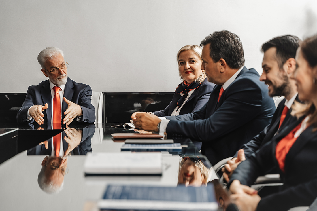 Board members meet to discuss business succession plans