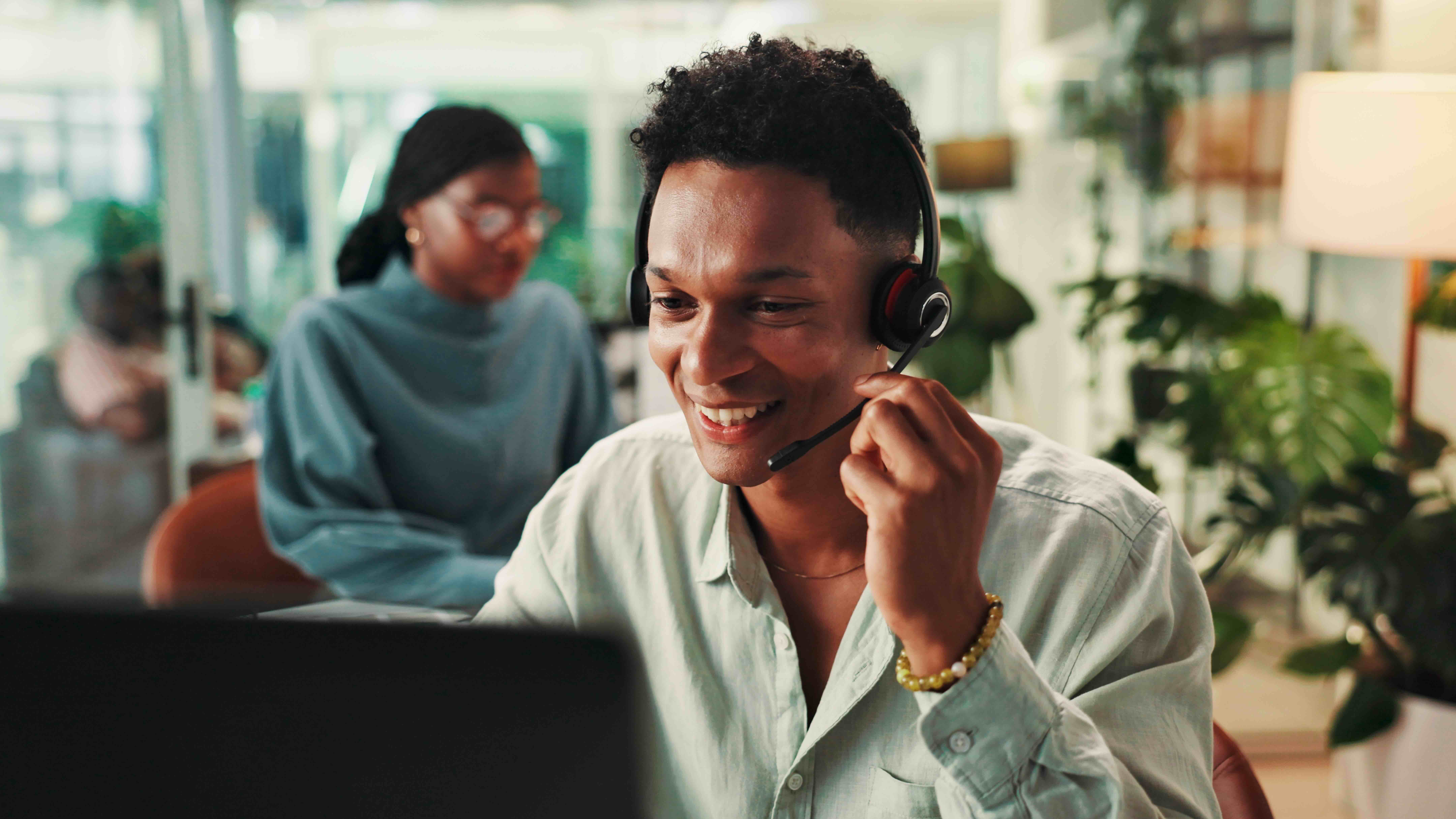 Sales professional on a sales call in office