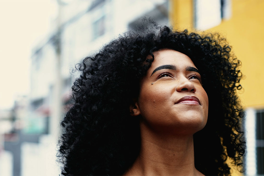 Close-up of woman looking up