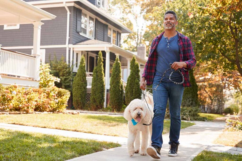 man taking a walk to recharge his energy and prevent burnout