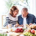 older couple boosting brain health through foods and activity