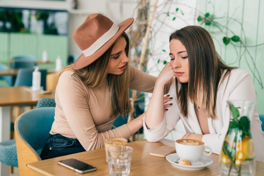 woman dealing with negative person with kindness