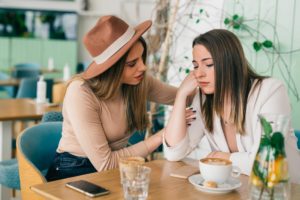 woman dealing with negative person with kindness
