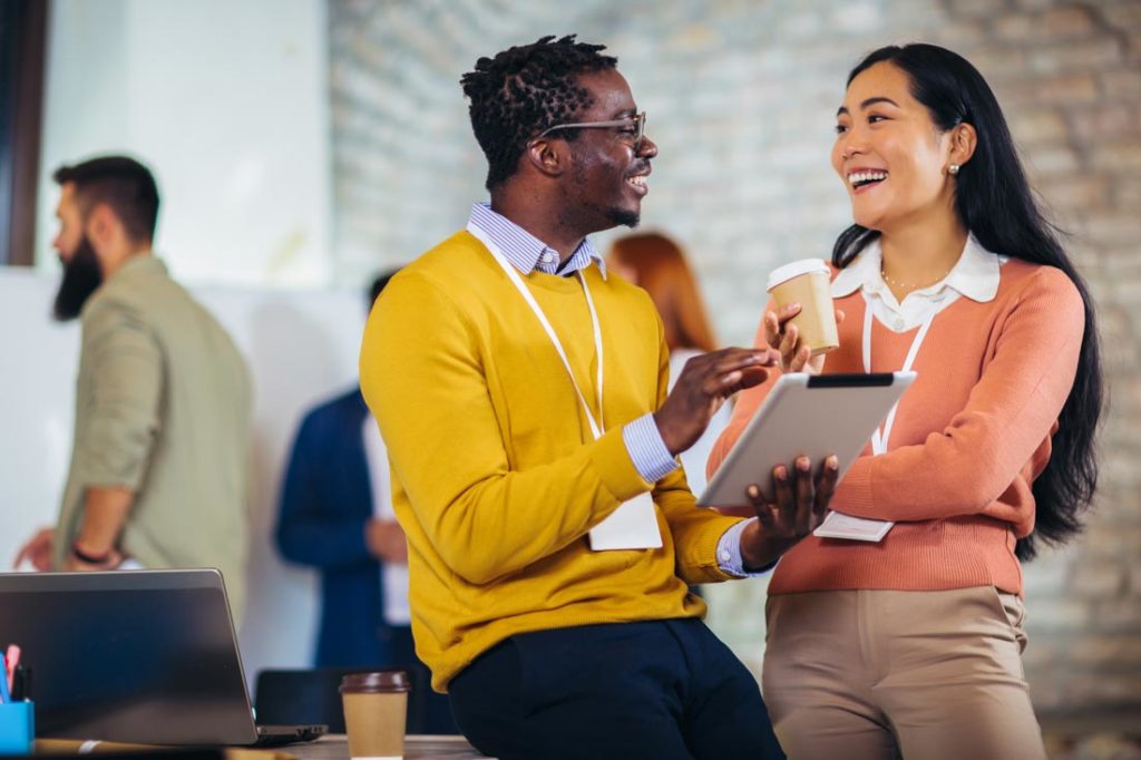 happy employees talking to each other