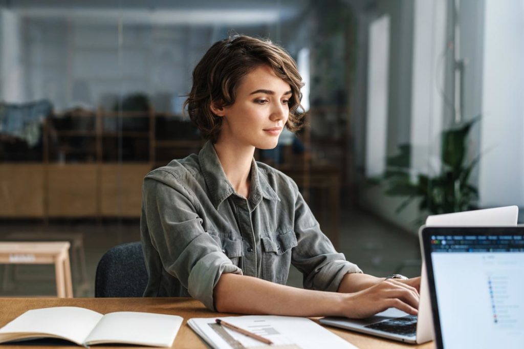 woman focusing at work to be more efficient