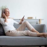 older woman meditating to improve brain health