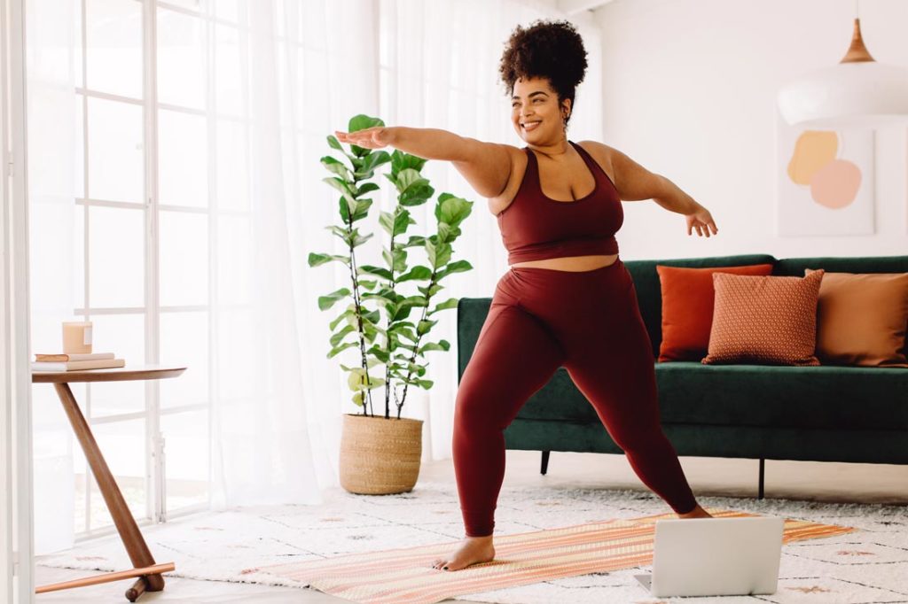 woman enjoying mental benefits of yoga