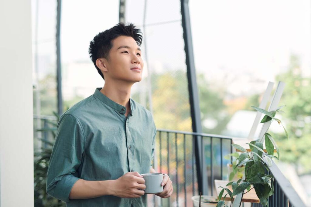 young man thinking about reinventing himself