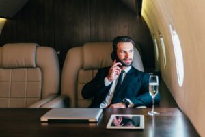 rich man flying in private plane