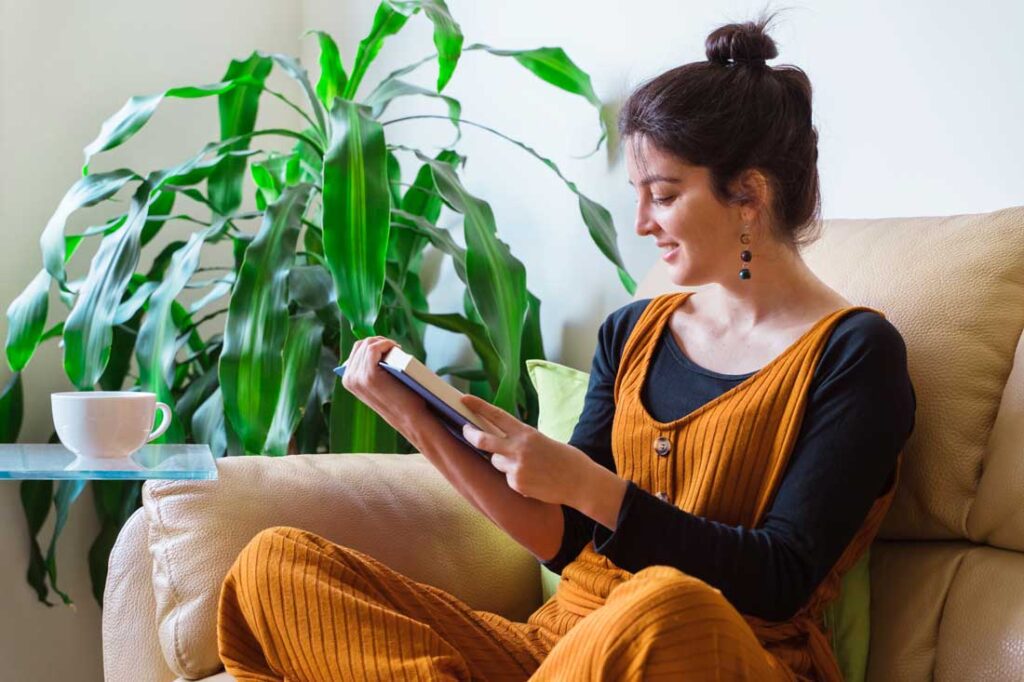 woman finding the joy in reading a book