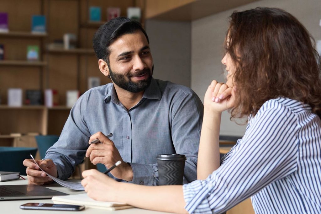 man with integrity talking to colleague