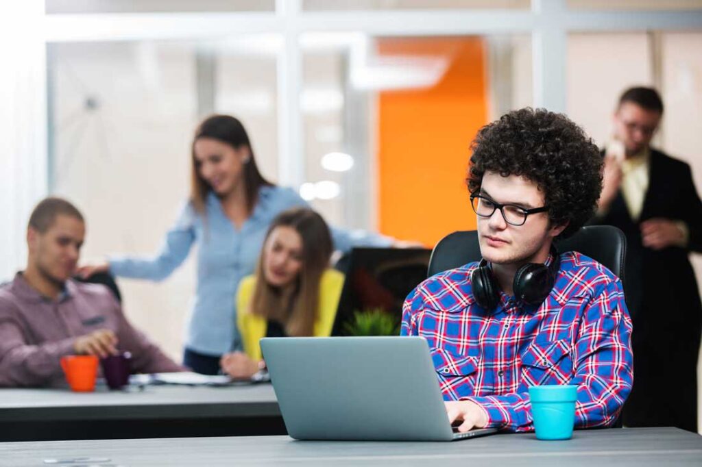 mentally checked out employee sitting alone at work