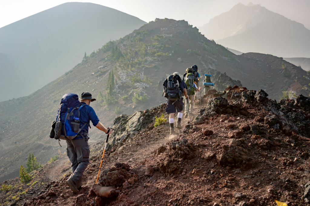 Individuals taking care of themselves by going on a hike