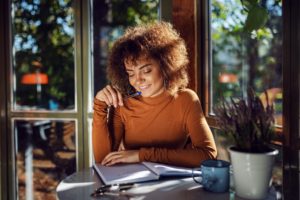 woman discovering ideal self through writing