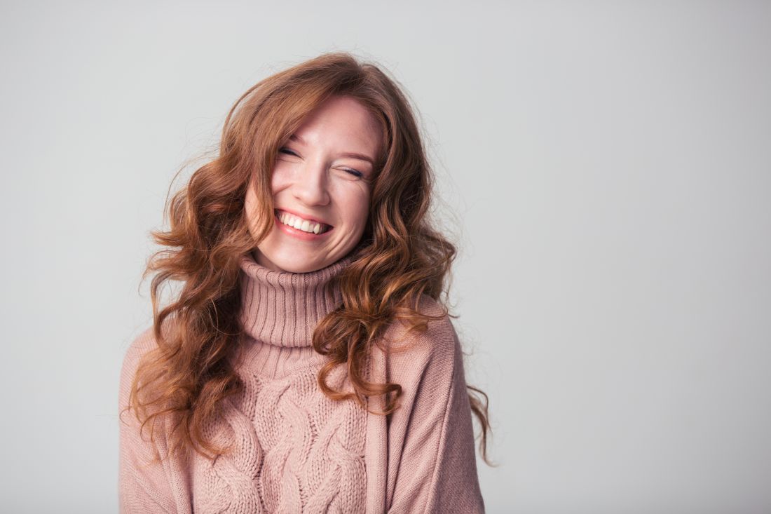 a woman smiling