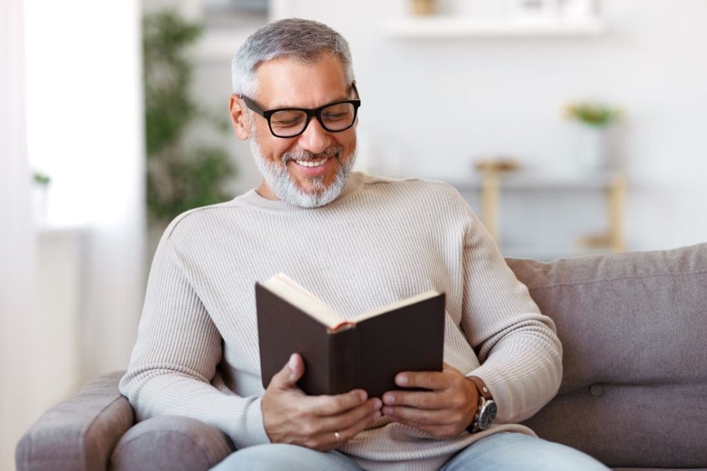 man reading book