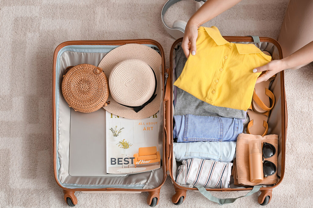 woman packing a suitcase