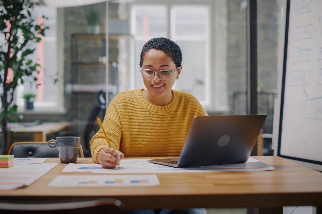 young entrepreneur working on finances using money advice