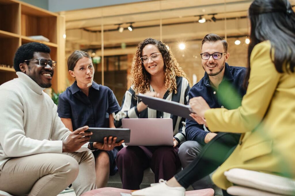 a group of colleagues happy with company culture changes