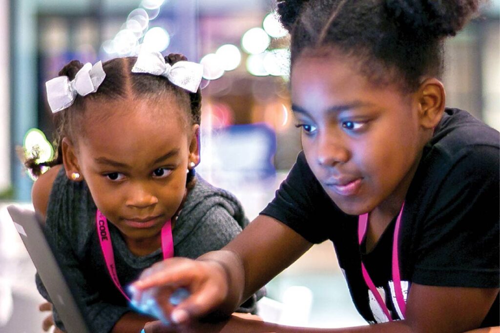 two members of Black Girls CODE working on a STEM project