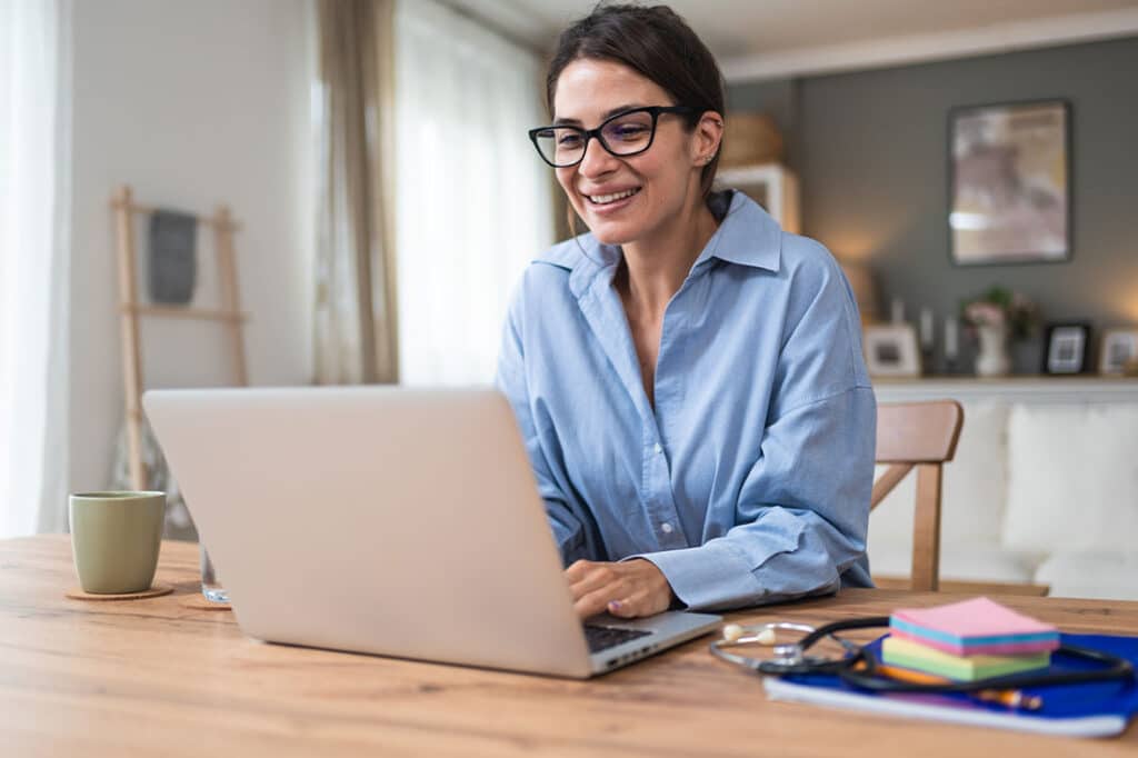 Young woman working at home office