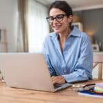 Young woman working at home office