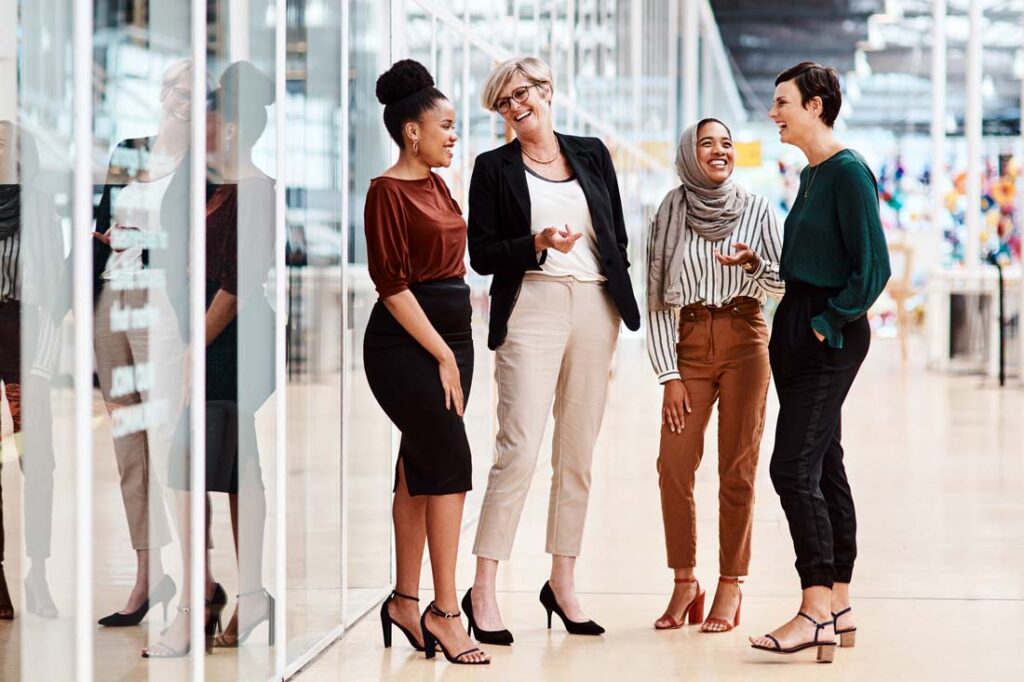 a group of women supporting each other at work