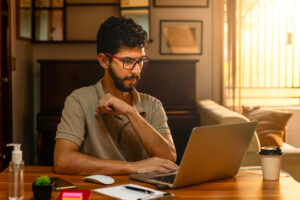 man maintaining productivity when working from home
