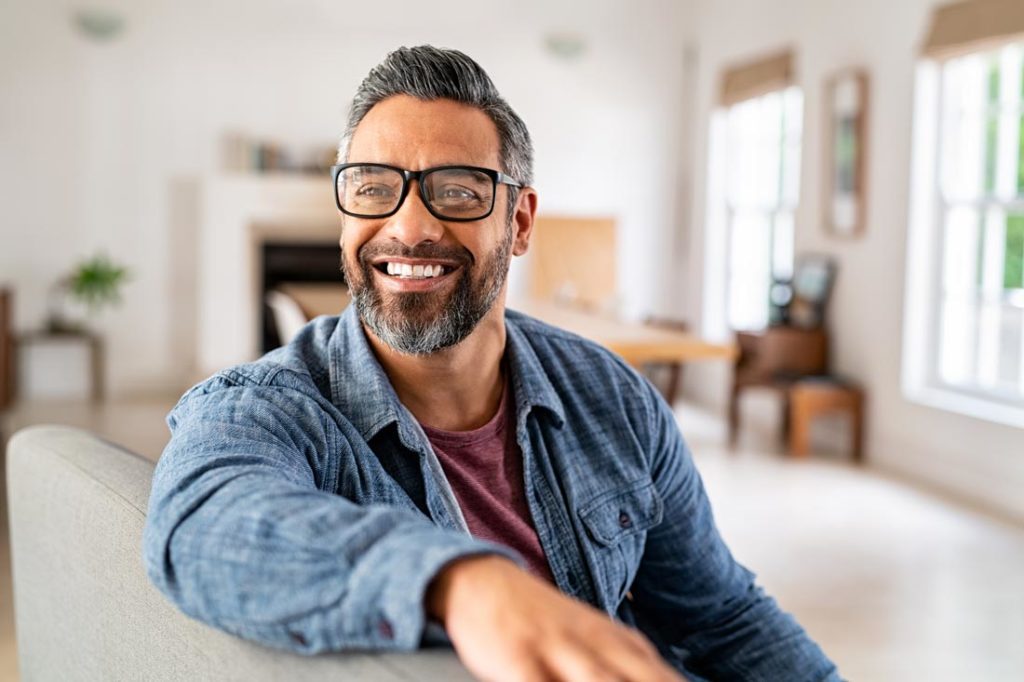 happy person smiling at home