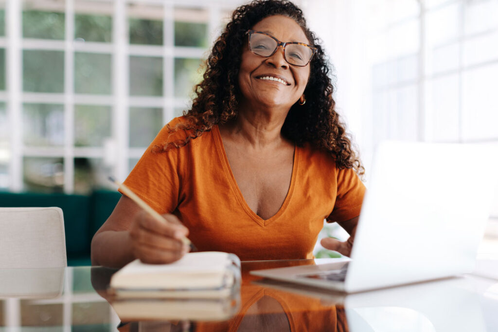 Mature Black woman setting her New Year goals