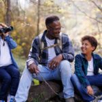 Highly successful father hiking with his daughter and son on the weekend