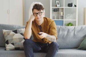 man feeling tired during free time leisure activity
