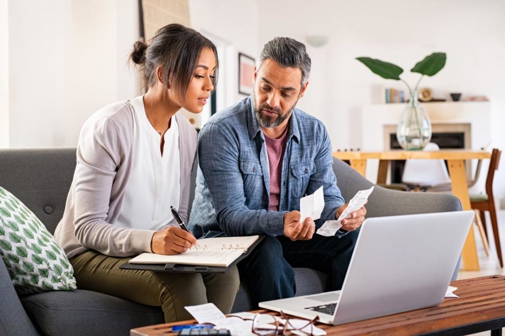 couple considering a high-yield savings account