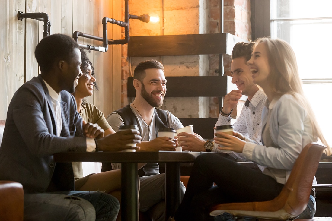 Coworkers connect over a coffee