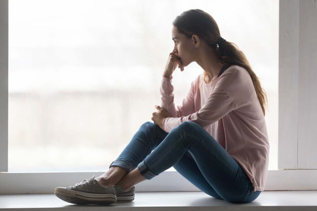 woman grieving the death of a co-worker