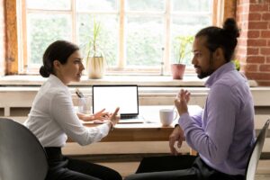 work frenemies talking about project