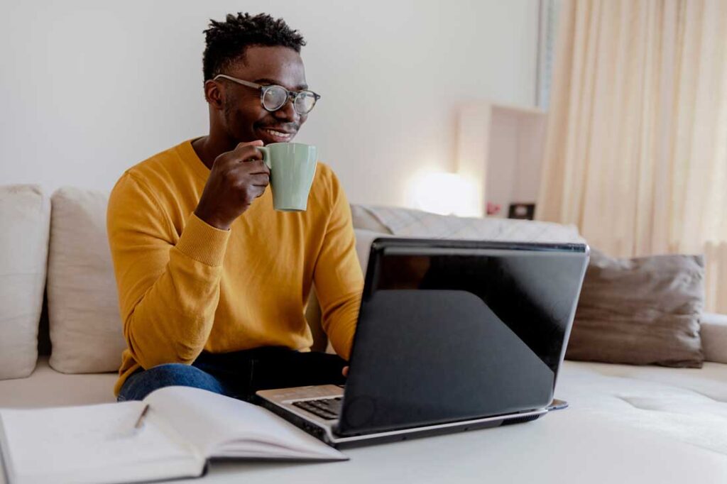 man working bare minimum monday from home