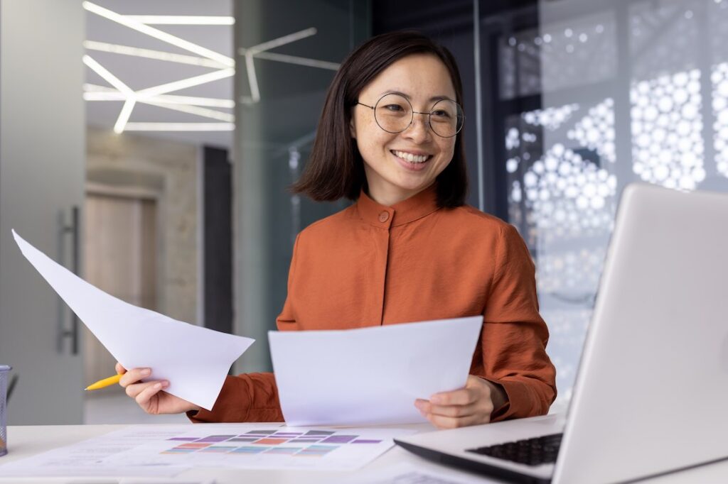 young woman happy at work