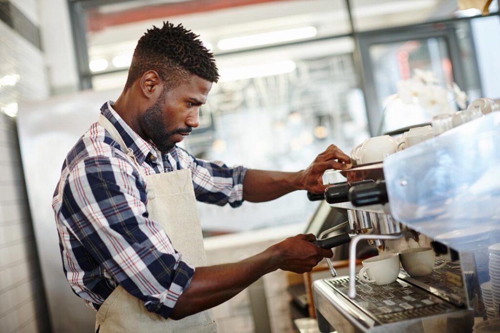 barista making coffee drink