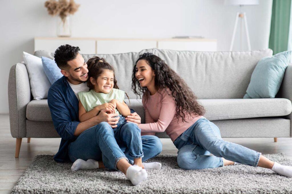 happy parents with small child