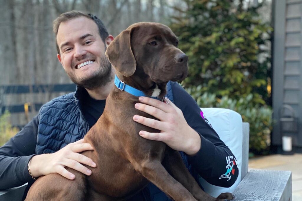 Brian Kelly, aka The Points Guy, with his dog