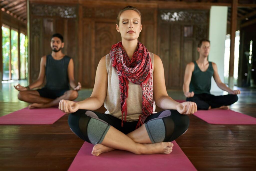 group meditating at an affordable meditation retreat