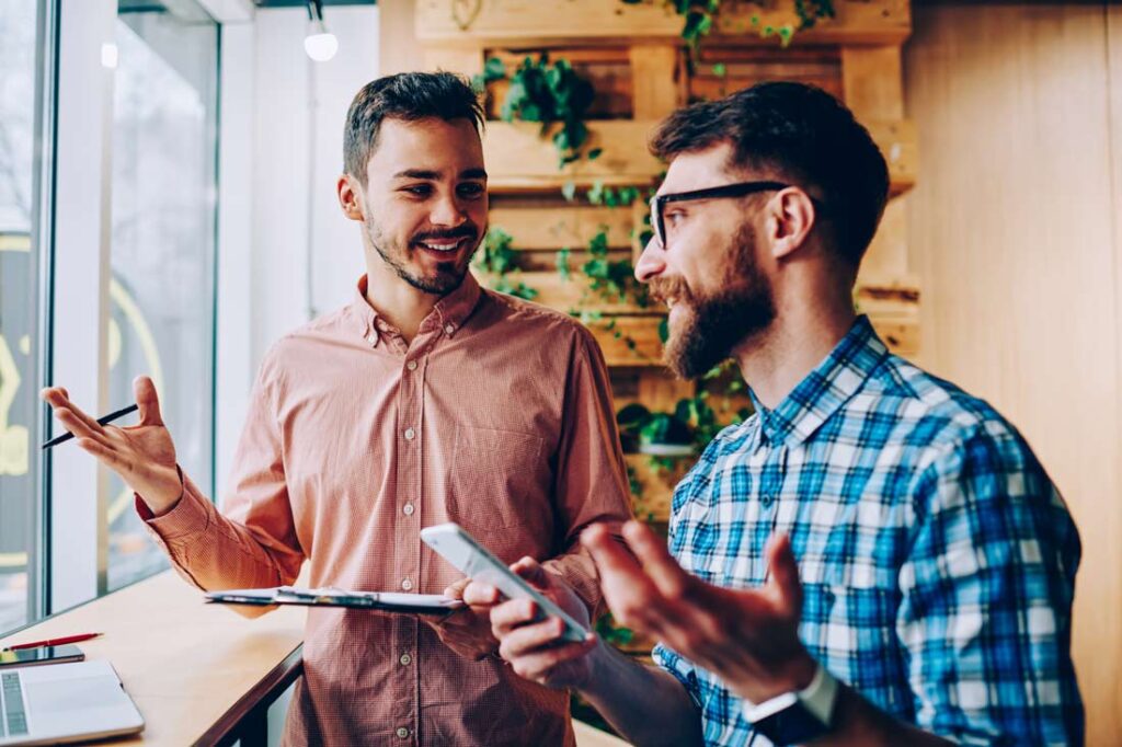 Two male friends going into business together