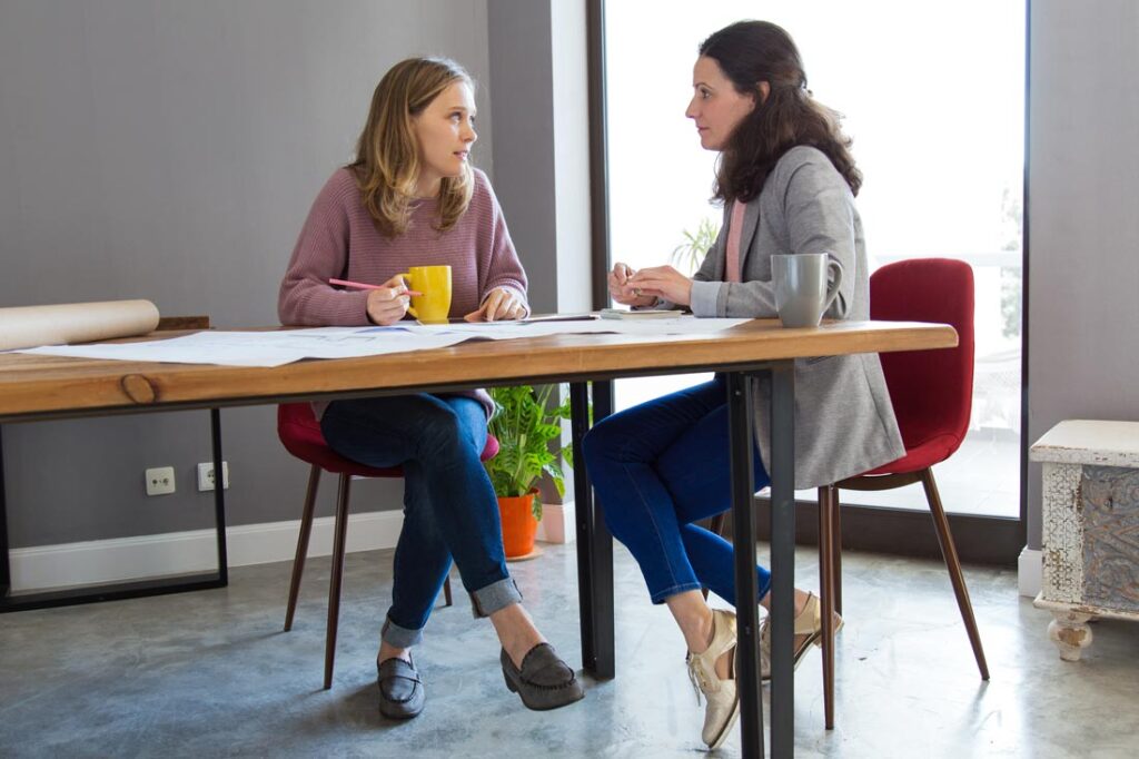 employee talking to boss about problems at work