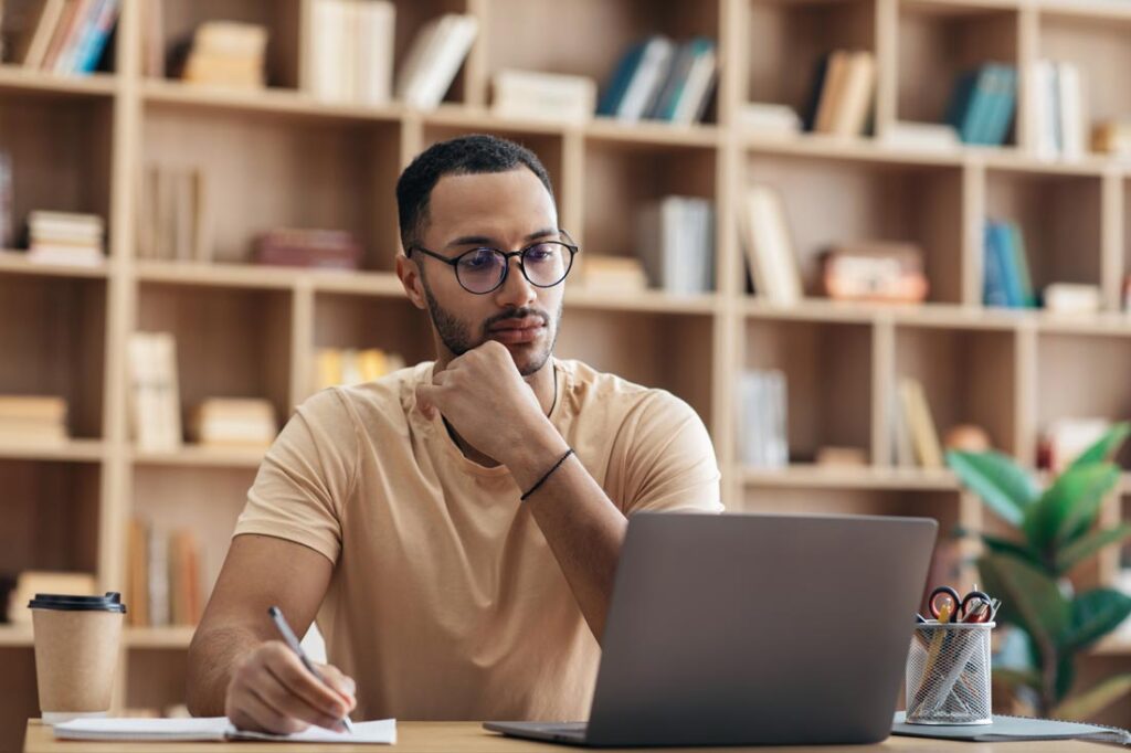 millennial man researching what I bonds are and whether to buy