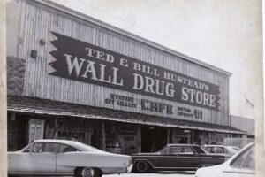 black and white picture of the Wall Drug storefront, a business that has learned how to survive a recession