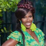 Bozoma Saint John smiling and wearing a bright green dress