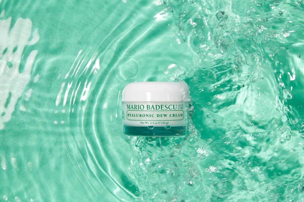 Photograph of Mario Badescu Hyaluronic Dew Cream in turquois colored water