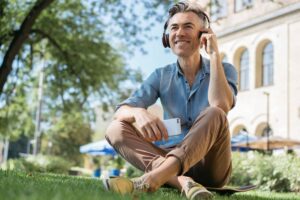man listening to a personal development podcast