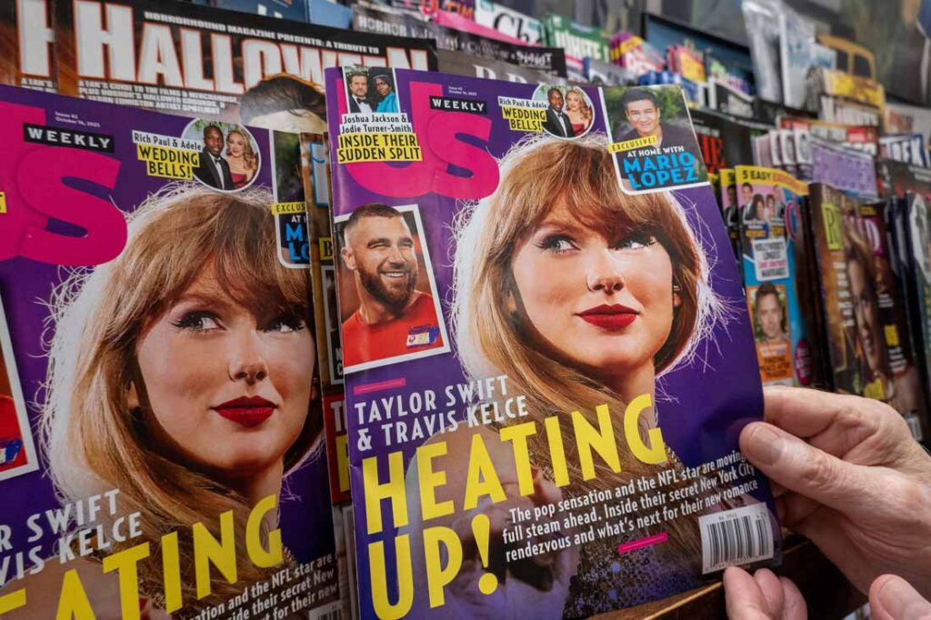 Taylor Swift & Travis Kelce on cover of US Magazine which is trendjacking their relationship buzz